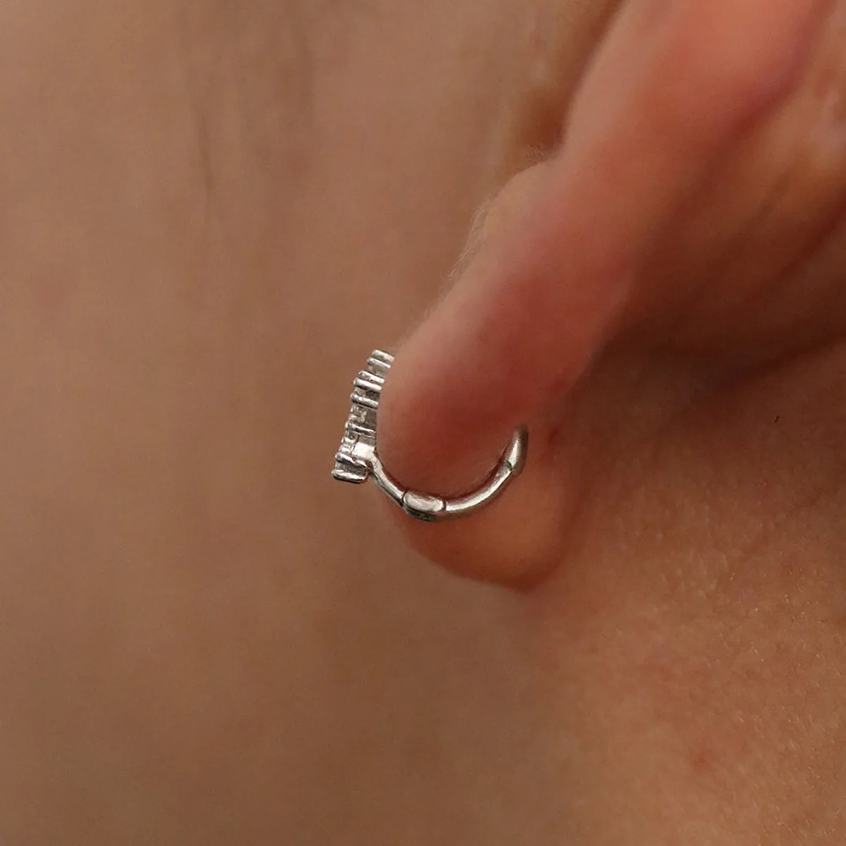 Cubic cross huggie earring - Image 7